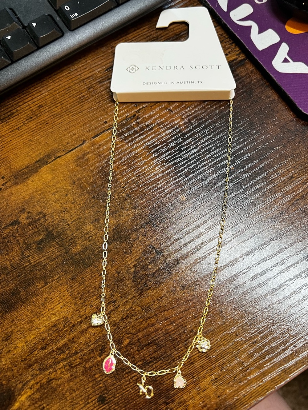 Kendra Scott Gold Charm Necklace with Pink and Clear Accents